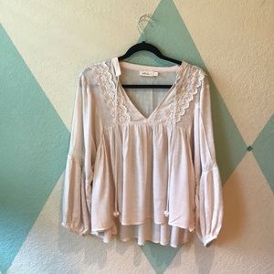 white, loose blouse.